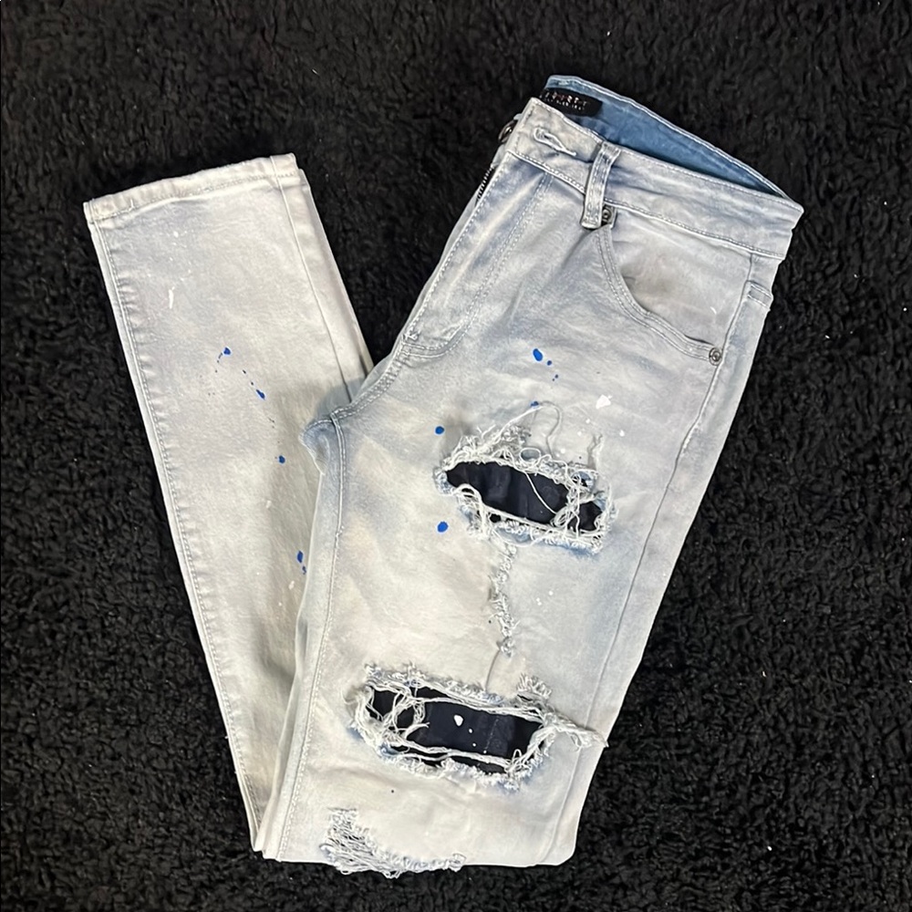 Distressed Light blue jeans with Paint Splatter
